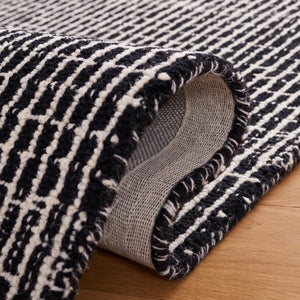 Dazed Black and Ivory Area Rug