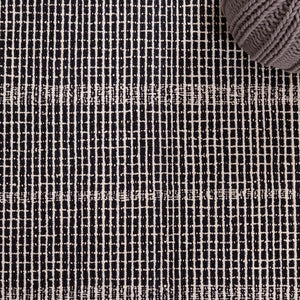 Dazed Black and Ivory Area Rug