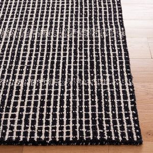 Dazed Black and Ivory Area Rug