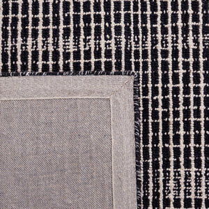 Dazed Black and Ivory Area Rug