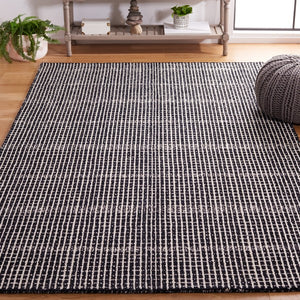 Dazed Black and Ivory Area Rug