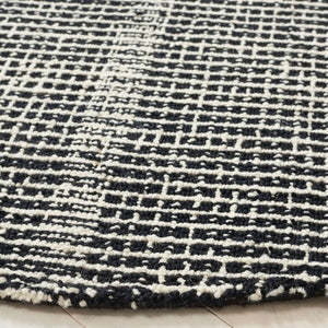 Dazed Black and Ivory Area Rug