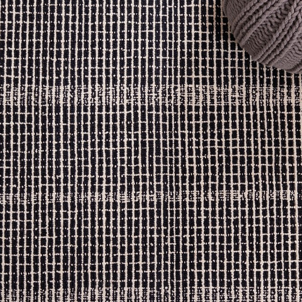 Dazed Black and Ivory Area Rug