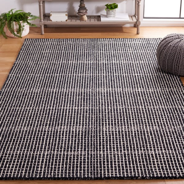 Dazed Black and Ivory Area Rug