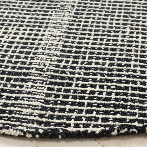 Dazed Black and Ivory Area Rug